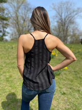 Load image into Gallery viewer, You can&#39;t go wrong with this striped tank top. It is flowy and doesn&#39;t wrinkle fast so you can do a cute front tuck, This top doesn&#39;t have much give in the bust area, I&#39;d recommend doing your true size. It is the perfect day to night top for the upcoming seasons! For a daytime look, pair it with a white pair of jeans and sandals, to transition into a night time look, change into a pair of wedges and a chunkier earring.

