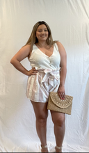 Load image into Gallery viewer, These paper bag shorts are so fun! It&#39;s always fun to have something different in your closet in addition to your denim shorts. These can be worn casually or dressed up with a wedge! They are high waisted with a back zipper and tie waist. These shorts are true to size.
