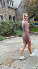 Load image into Gallery viewer, We are totally okay with repeating this dress in two colors because it is a CLASSIC! The round neckline along with the long sleeves makes this dress perfect for the cooler weather. Pair it with boots, sneakers, or heels! The twin drawstrings on each side are adjustable and make for an extremely flattering ruching effect! The material is the softest material you could imagine! Cozy yet sexy!
