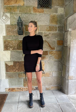 Load image into Gallery viewer, We are totally okay with repeating this dress in two colors because it is a CLASSIC! The round neckline along with the long sleeves makes this dress perfect for the cooler weather. Pair it with boots, sneakers, or heels! The twin drawstrings on each side are adjustable and make for an extremely flattering ruching effect! The material is the softest material you could imagine! Cozy yet sexy!
